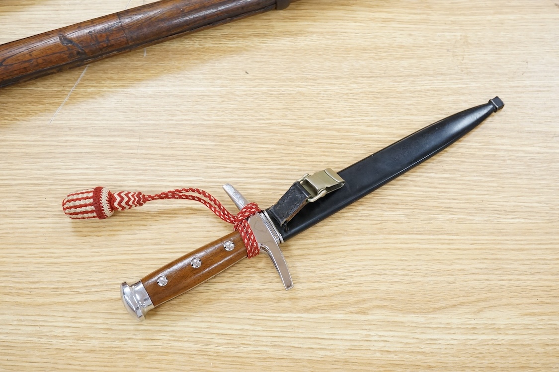 A post 1943 Swiss Army dagger, with knot and scabbard